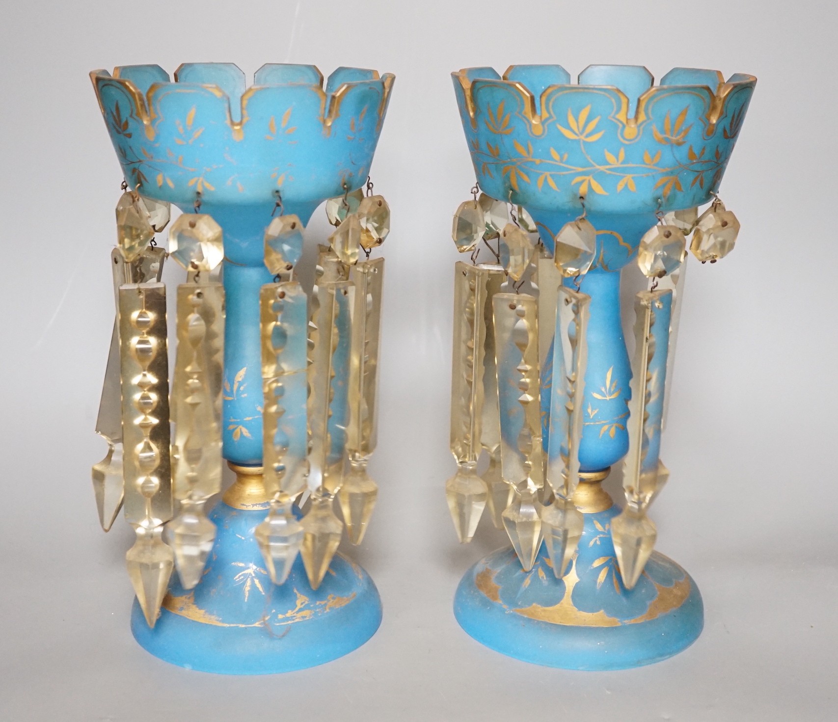 A pair of 19th century turquoise glass table lustres, 27.5cm